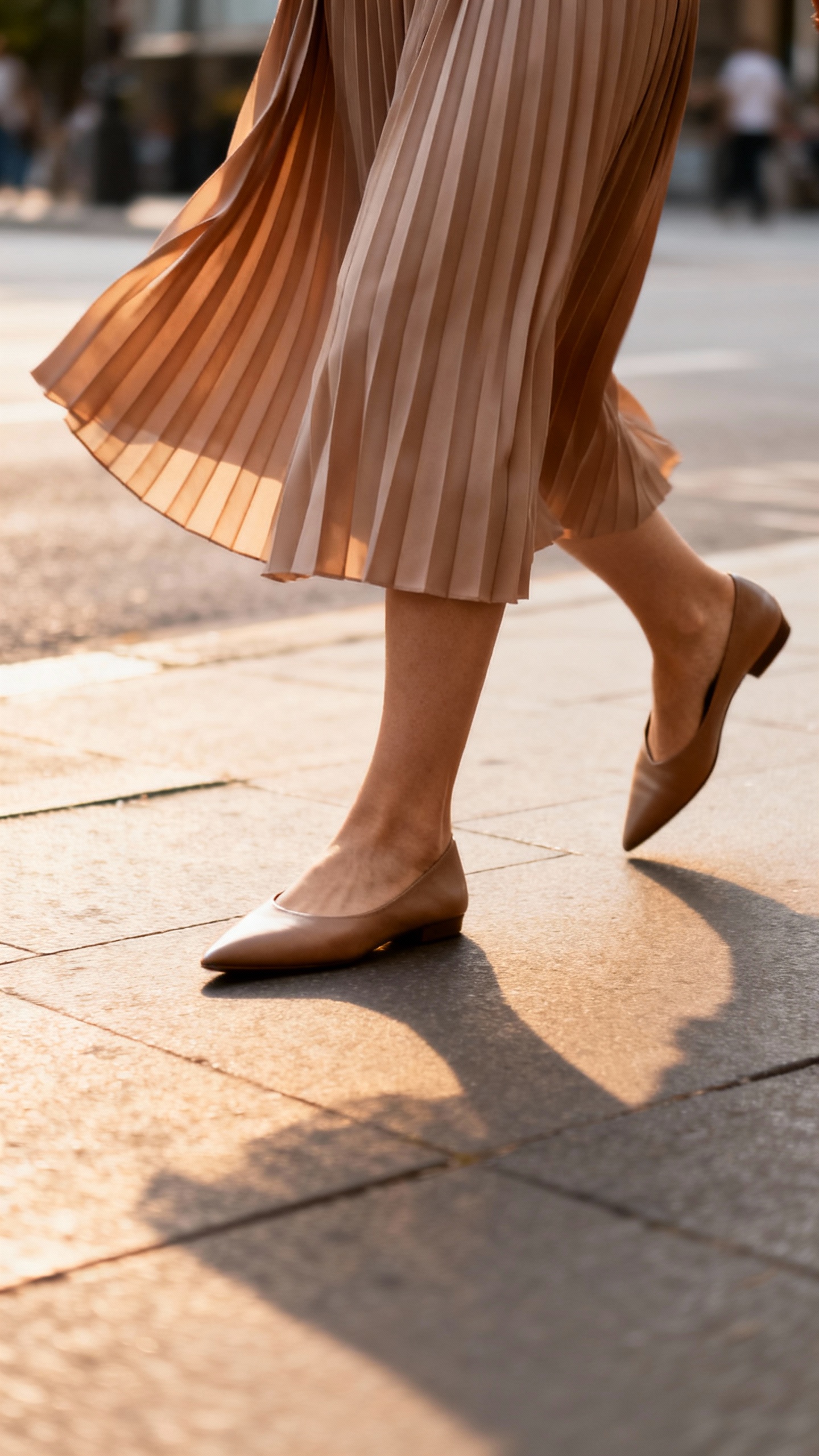 Female walking in pointed flats, pleated skirt swaying, smooth stride