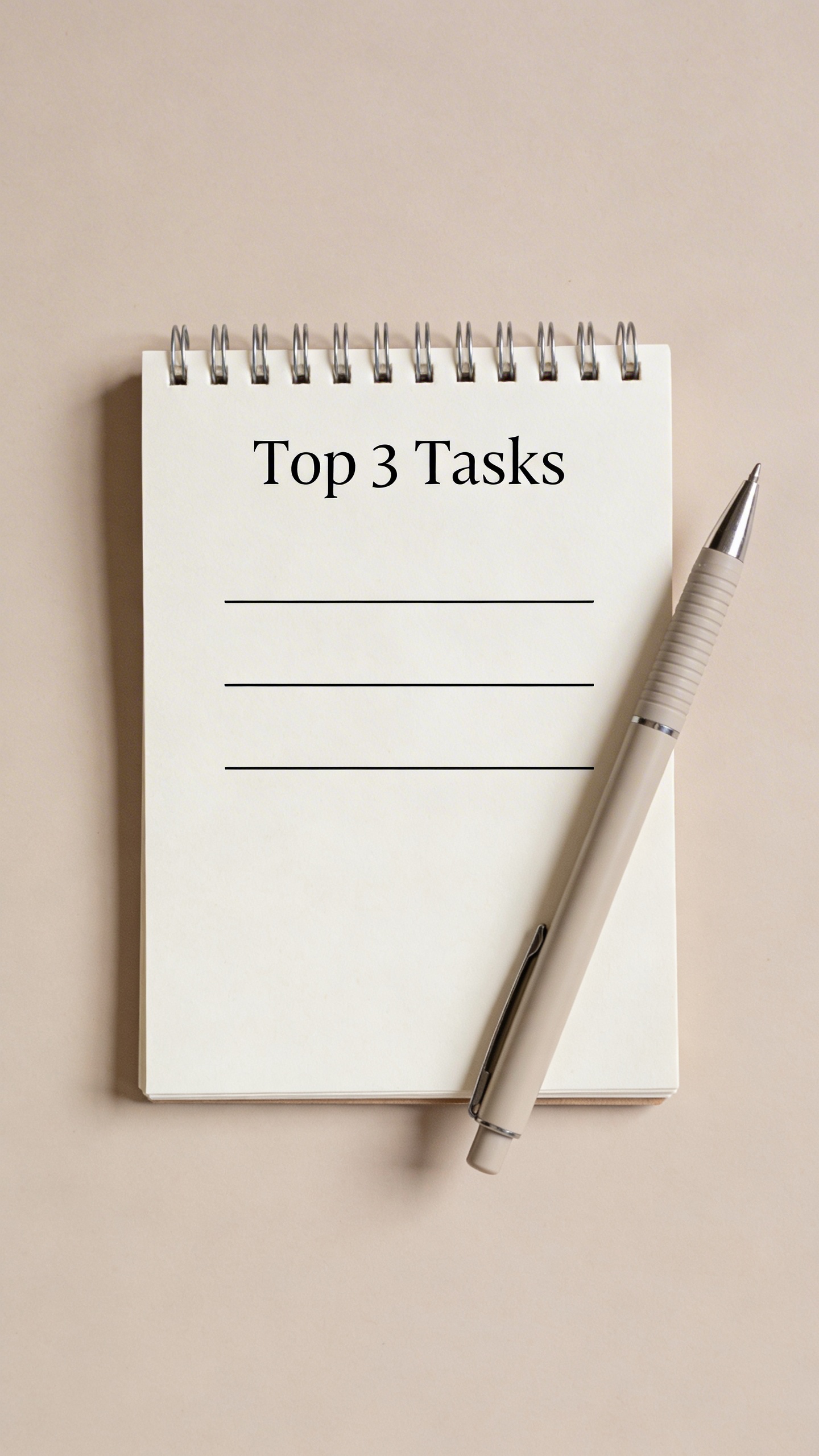 minimalist notepad titled “Top 3 Tasks” with pen