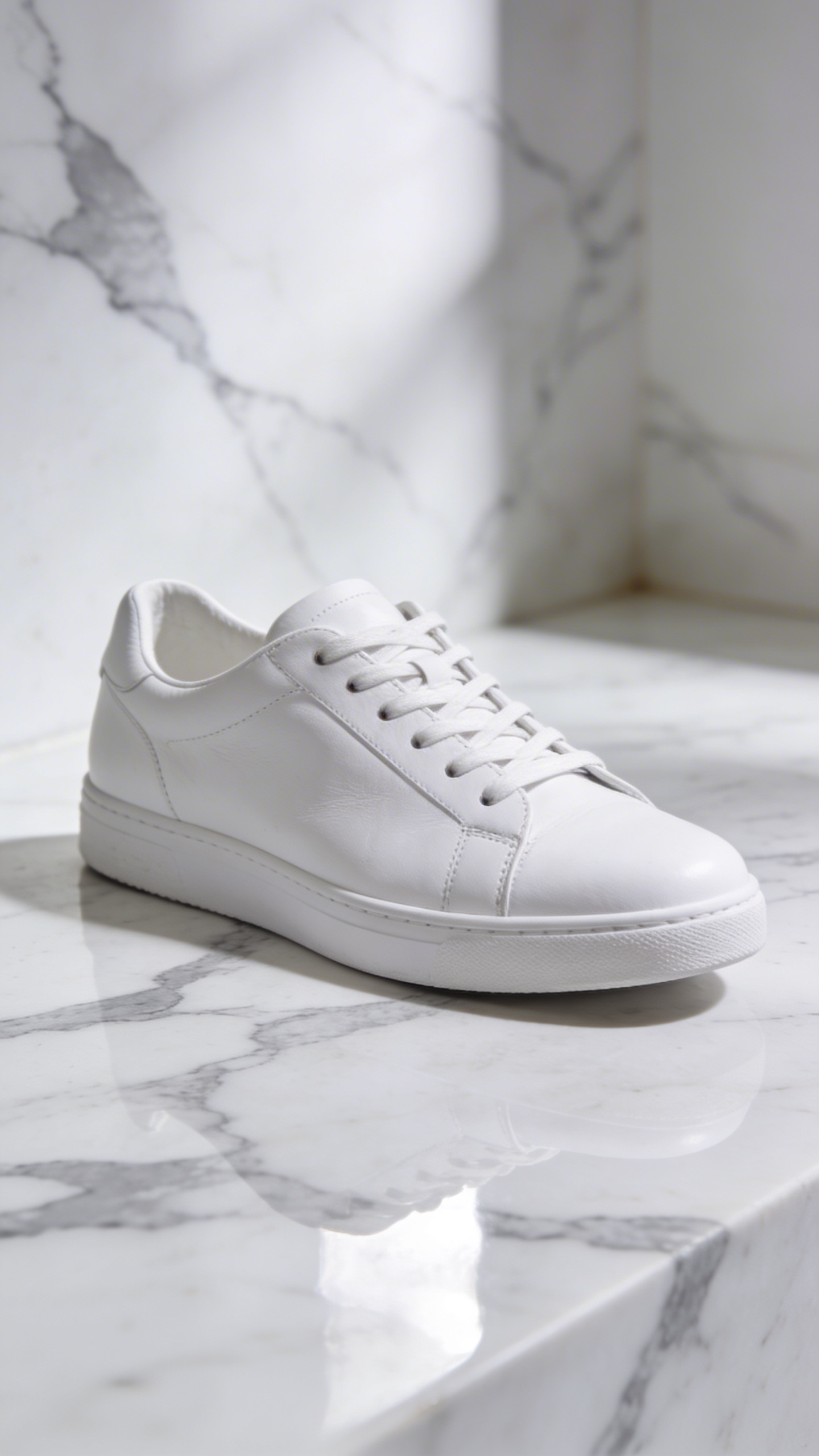 white leather sneaker on marble surface, studio lighting